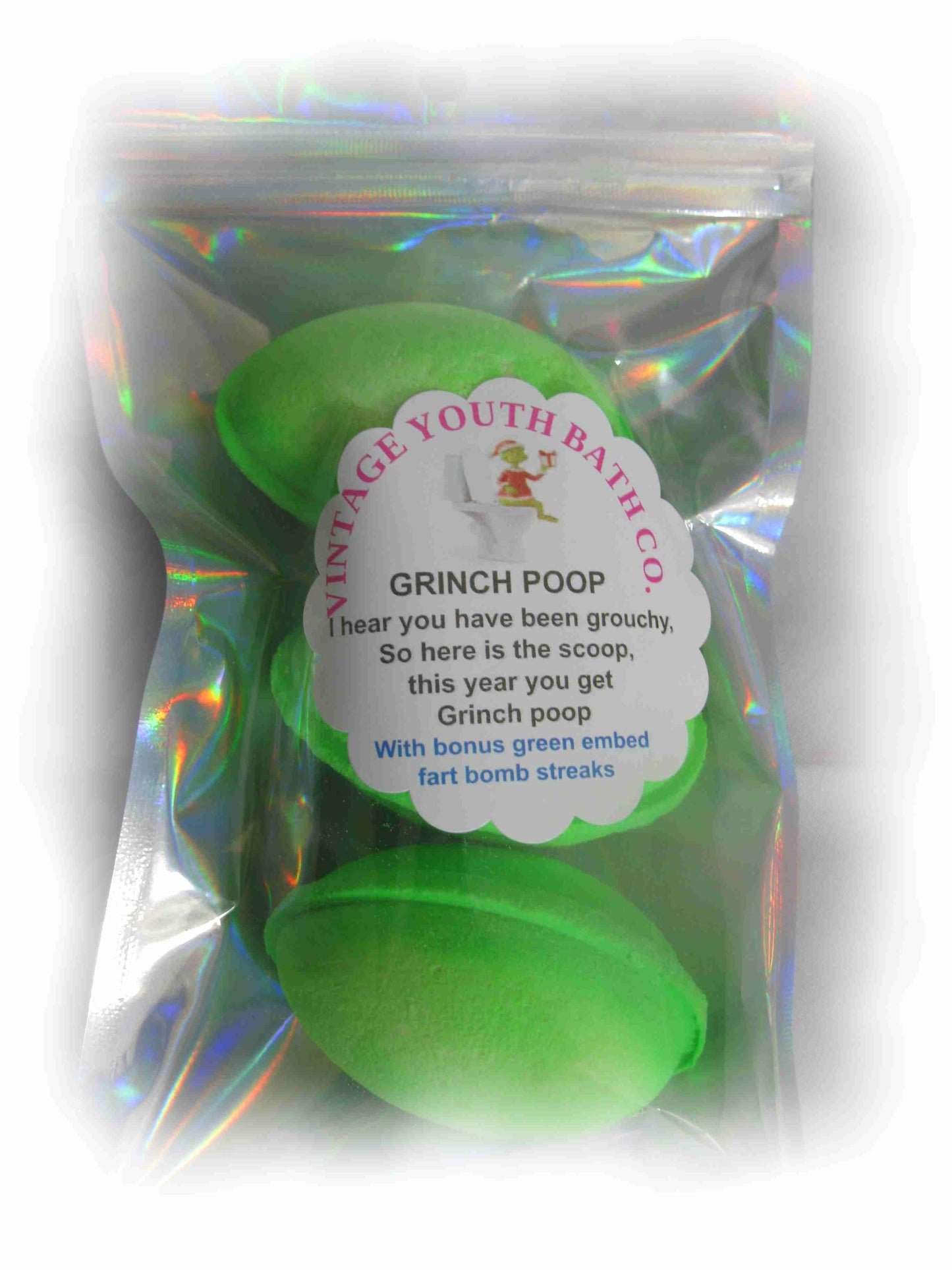 Grinch poop mini bath bombs with blasts of colour in the bonus fart bombs  I hear you have been naughty, So here is the scoop, This year your getting Grinch Poop.  Merry Berry Christmas Fragrance  With bonus green fart bomb embed streaks  Each package contains 3 bombs total